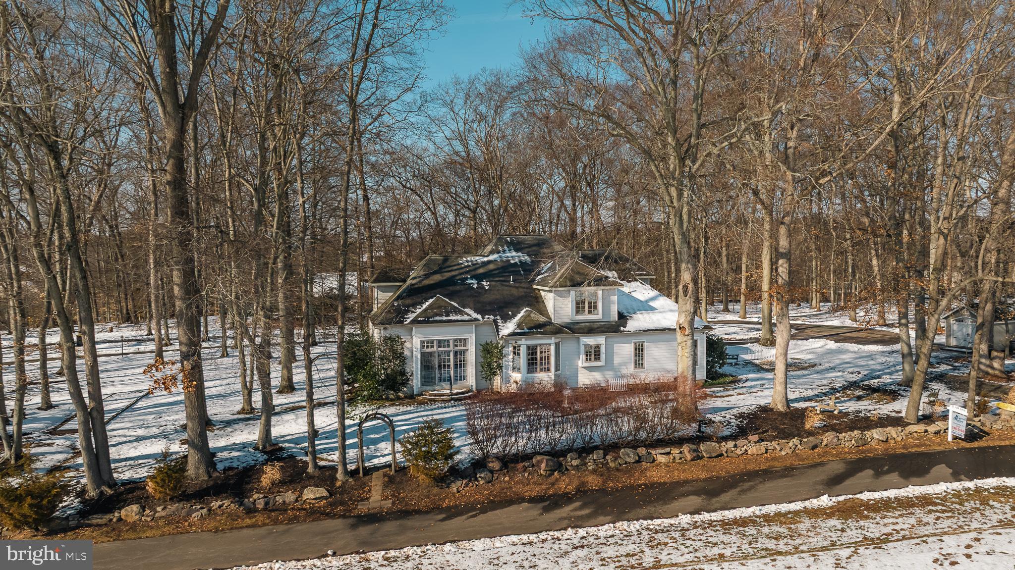 137 Wells Road Doylestown, PA 18901 - Photo 95 of 102 a front view of a house with a yard