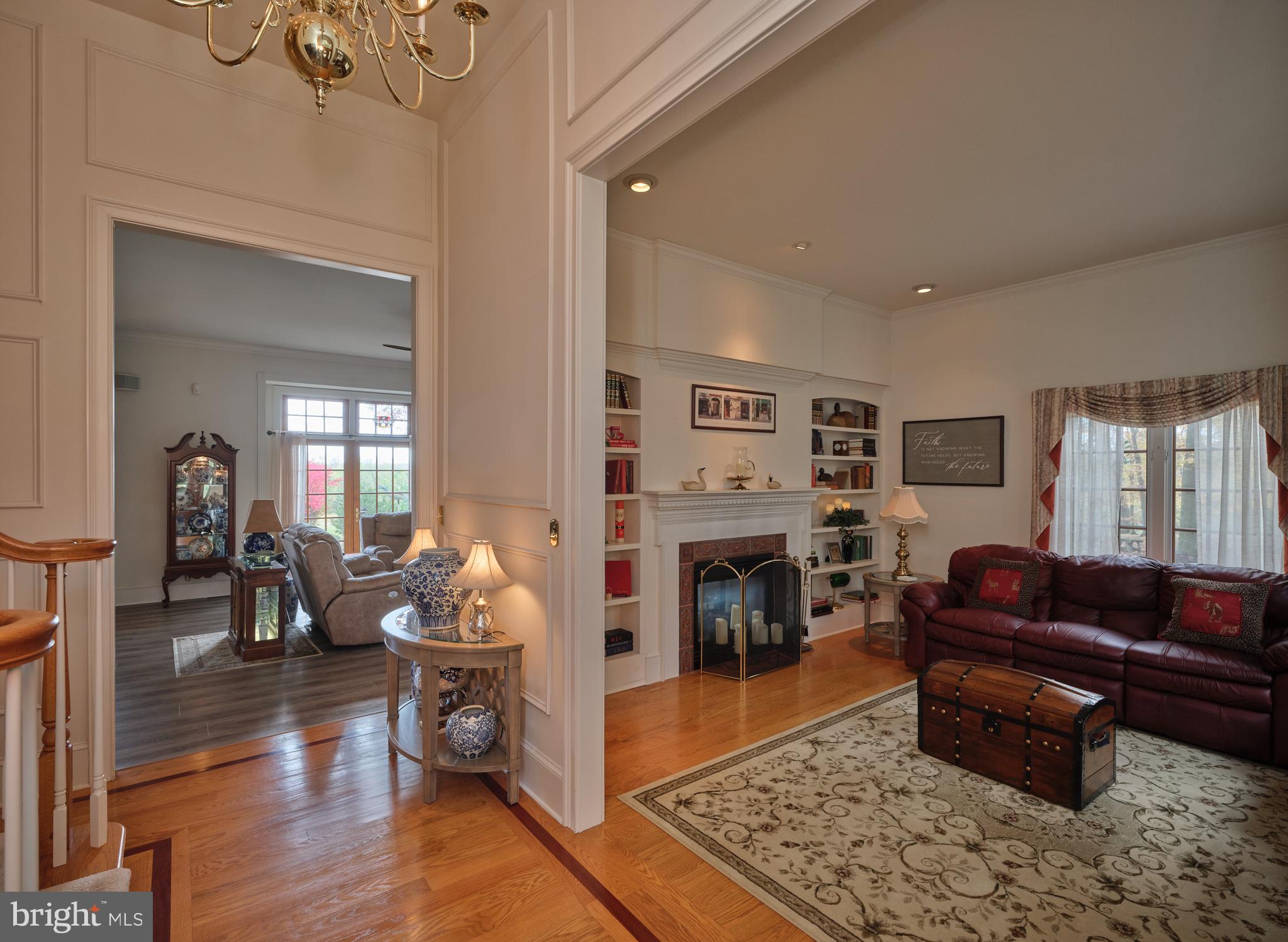 137 Wells Road Doylestown, PA 18901 - Photo 10 of 54 a living room with furniture and a fireplace