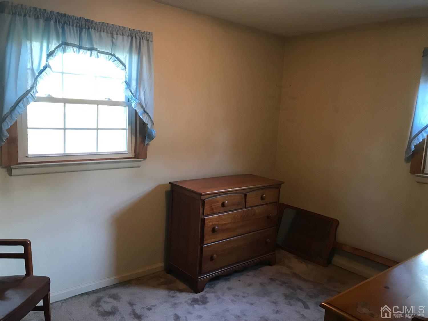 137 Milltown Road East Brunswick, NJ 08816 - Photo 14 of 22 an empty room with a window