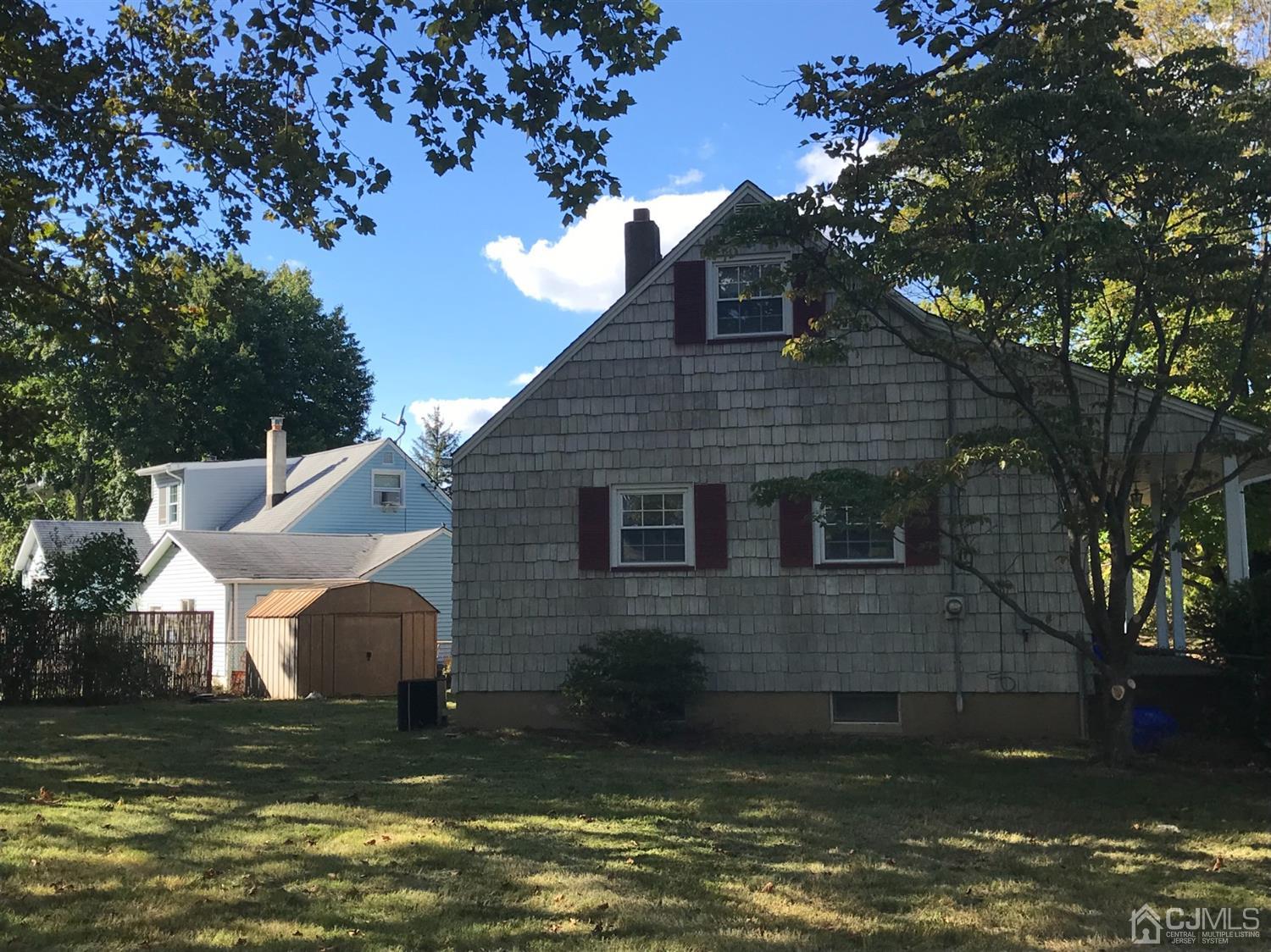 137 Milltown Road East Brunswick, NJ 08816 - Photo 21 of 22 a view of a house with a yard