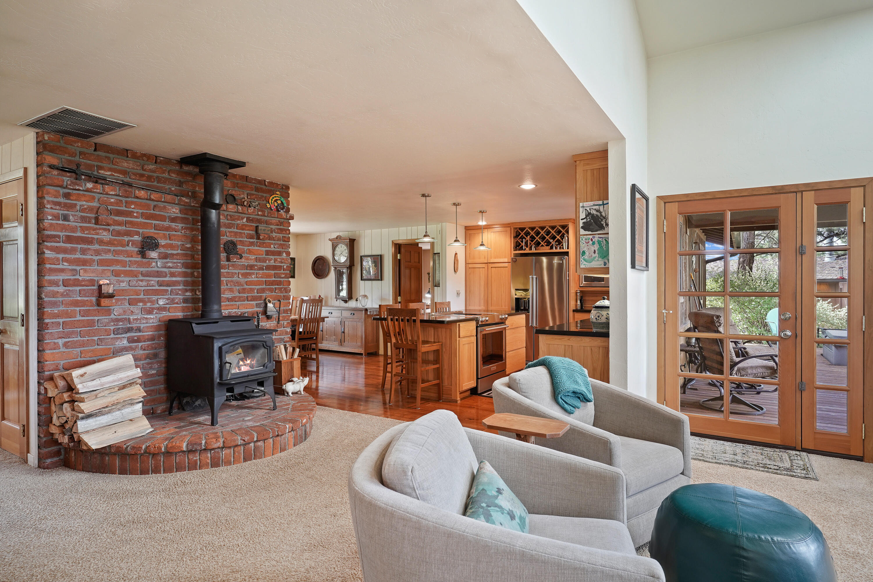 62636 Erickson Road Bend, OR 97701 - Photo 14 of 47 a living room with furniture and a fireplace