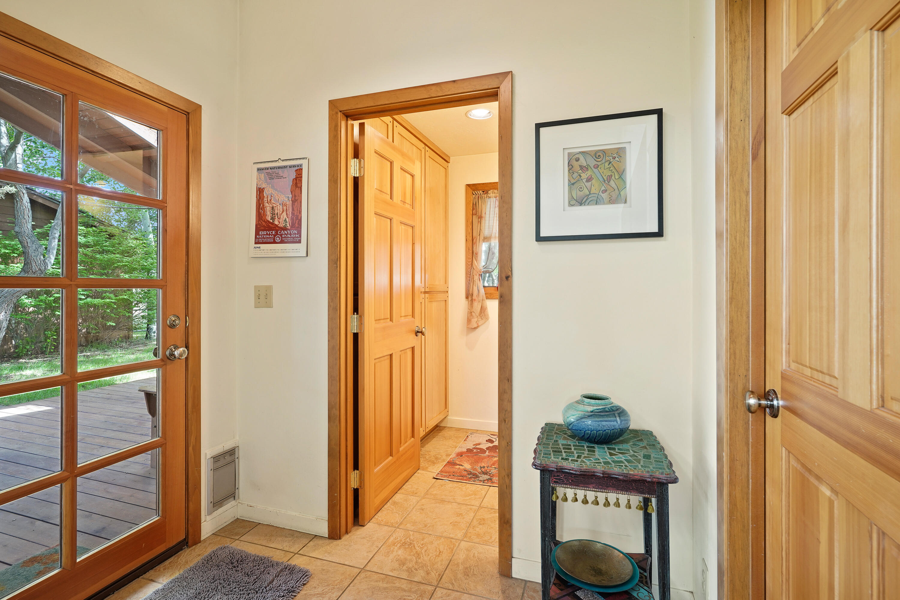 62636 Erickson Road Bend, OR 97701 - Photo 18 of 47 a hallway with painting and a window