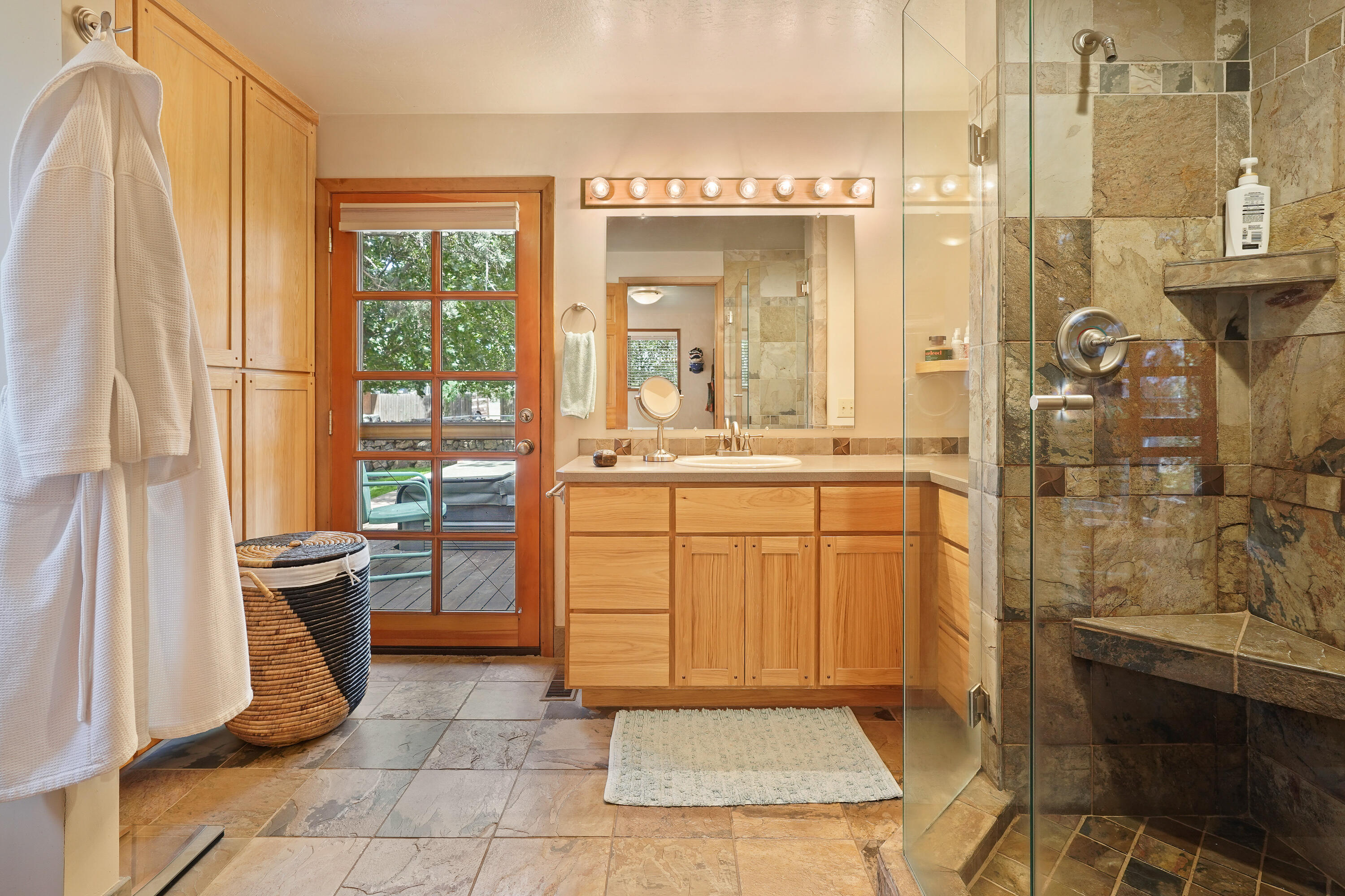 62636 Erickson Road Bend, OR 97701 - Photo 22 of 47 a bathroom with a sink a toilet and shower