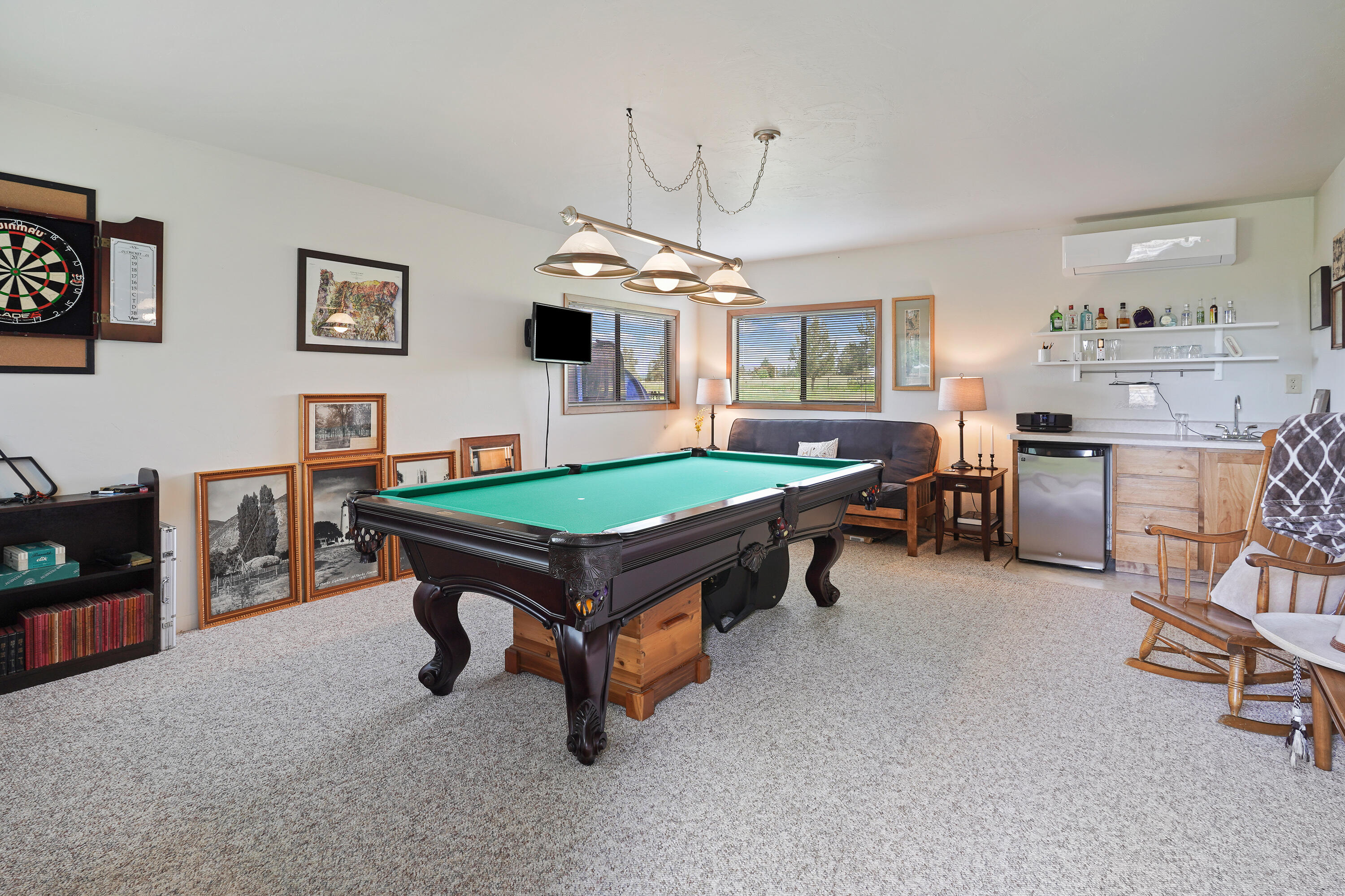 62636 Erickson Road Bend, OR 97701 - Photo 30 of 47 a room with pool table and windows