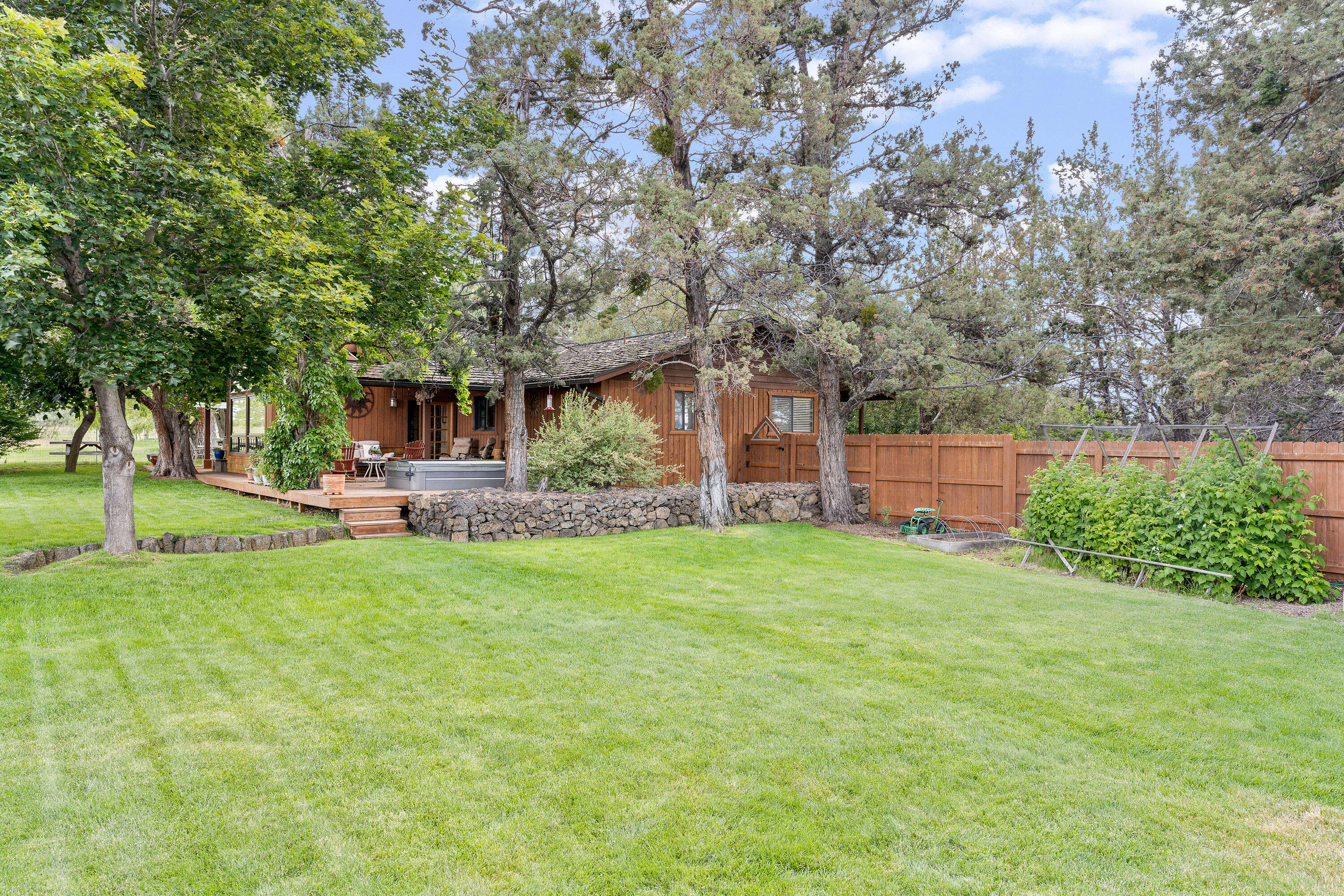 62636 Erickson Road Bend, OR 97701 - Photo 36 of 47 a front view of a house with garden