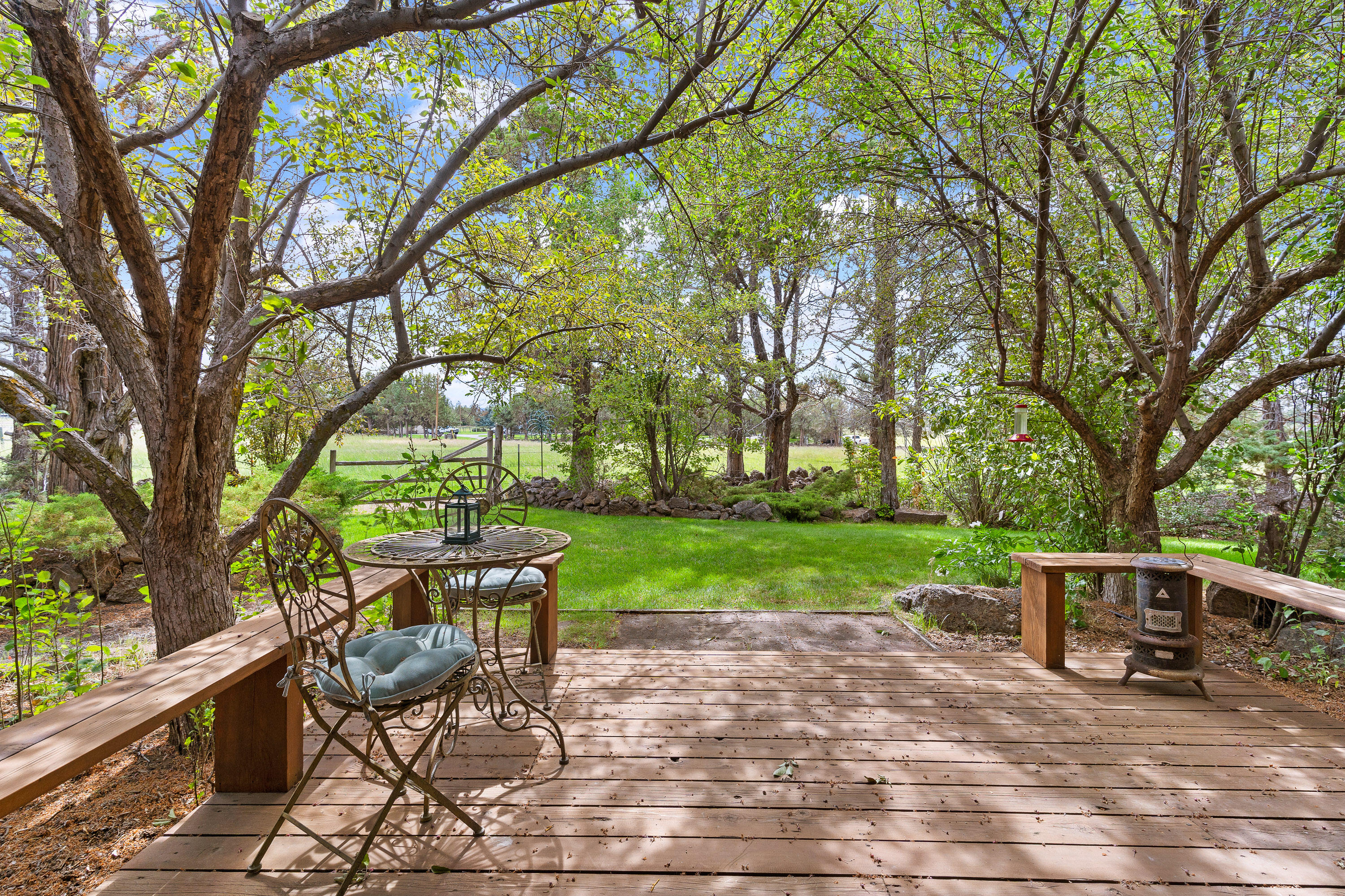 62636 Erickson Road Bend, OR 97701 - Photo 4 of 47 a view of a backyard with sitting area