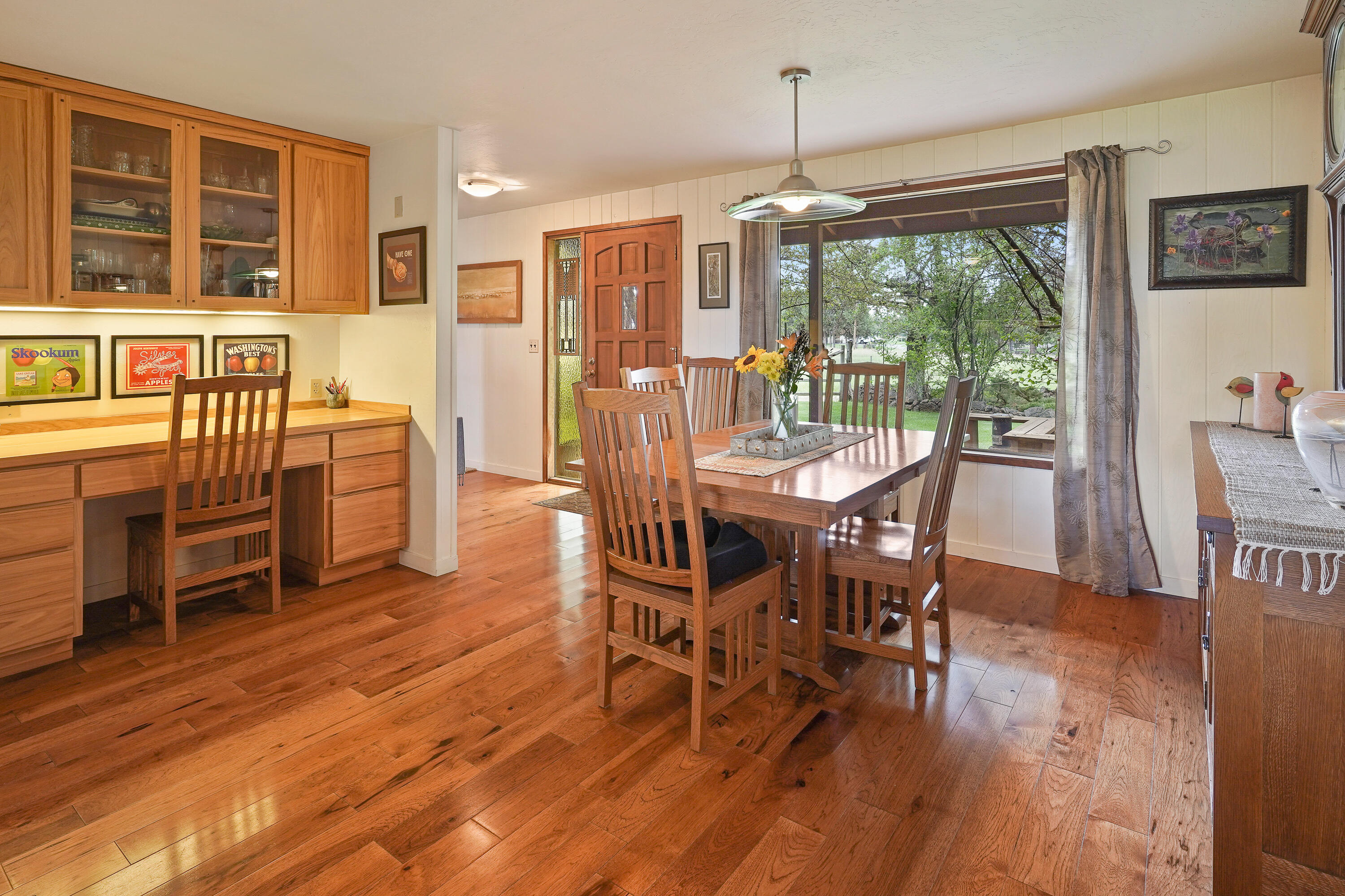 62636 Erickson Road Bend, OR 97701 - Photo 9 of 47 a dining room with furniture window wooden floor