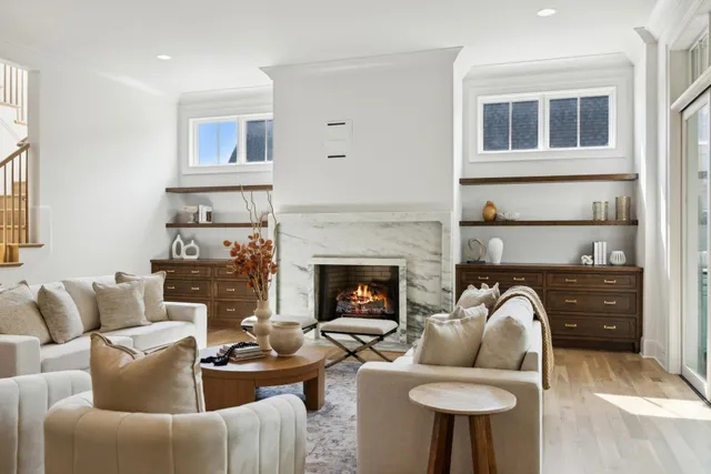 a kitchen with a table chairs and entryway