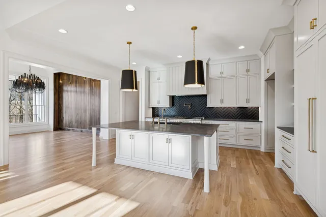 a living room with a table and a window