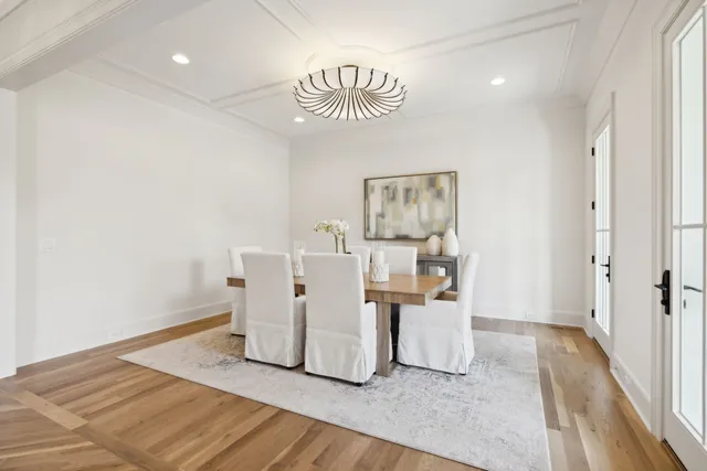 a view of kitchen with furniture and wooden floor