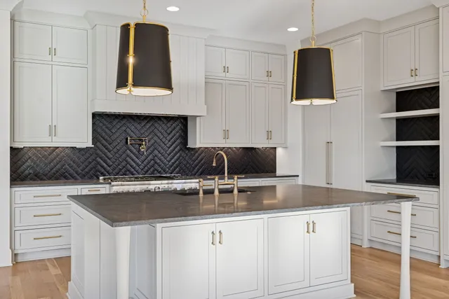 a spacious bedroom with a bed and a table