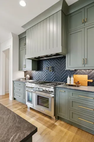 a spacious bedroom with a bed and a table