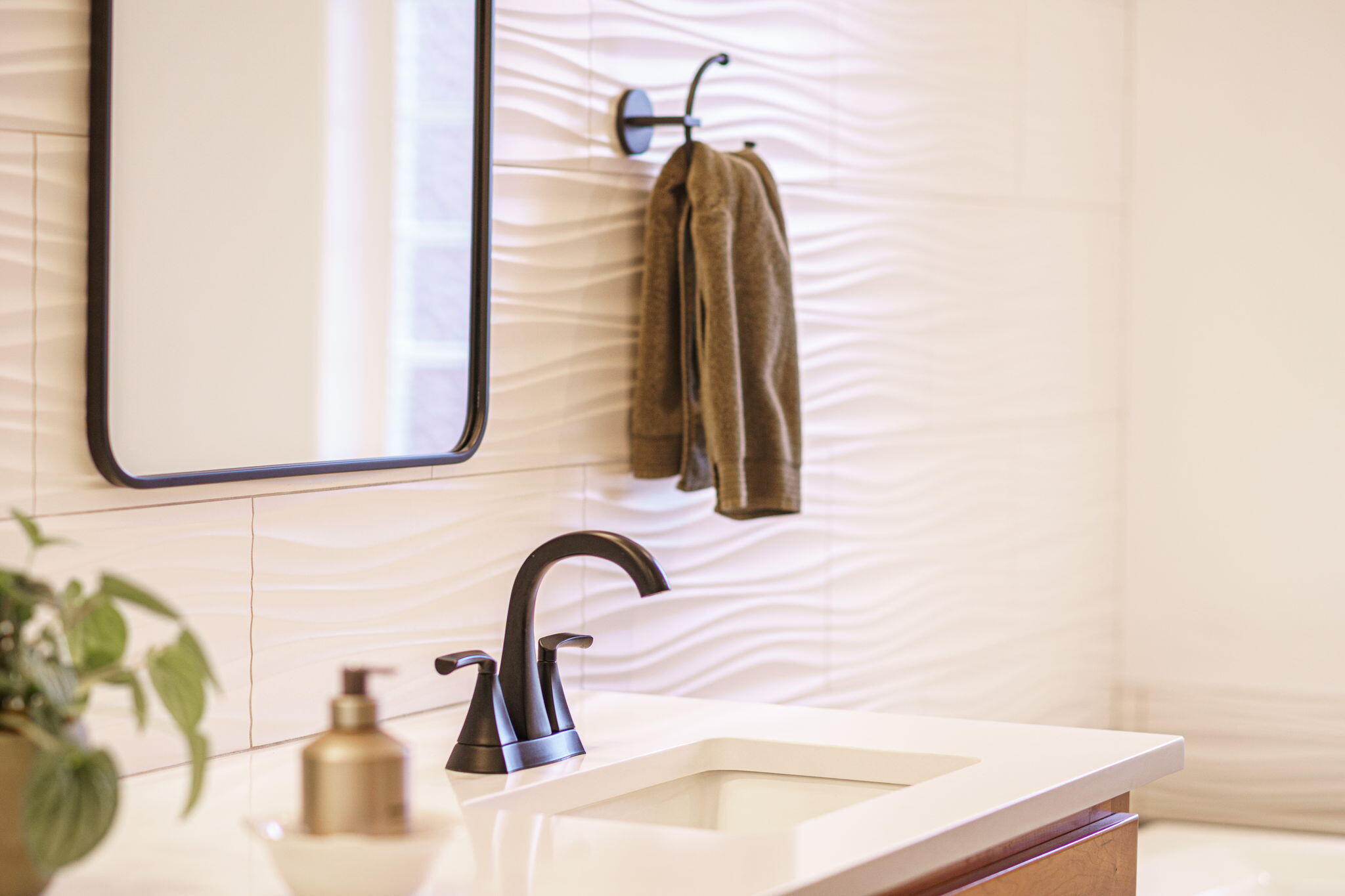 10942 Village Loop Redmond, OR 97756 - Photo 3 of 45 a bathroom with a sink and a mirror