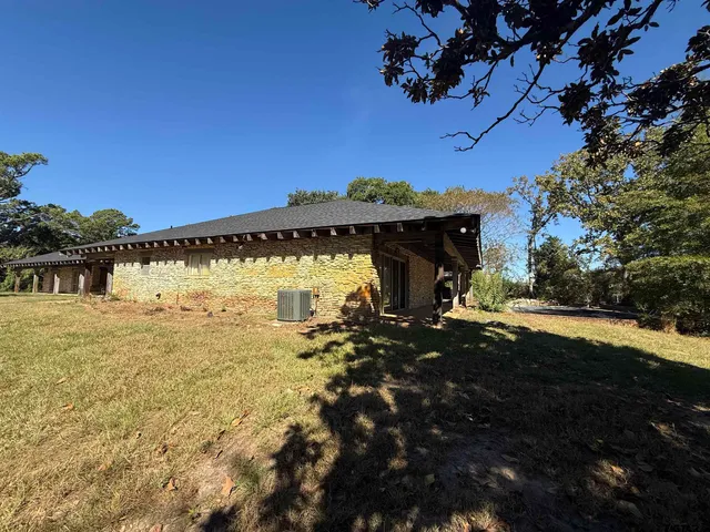 a view of a house with a big yard