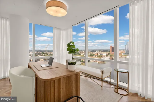 a room with a table and chairs