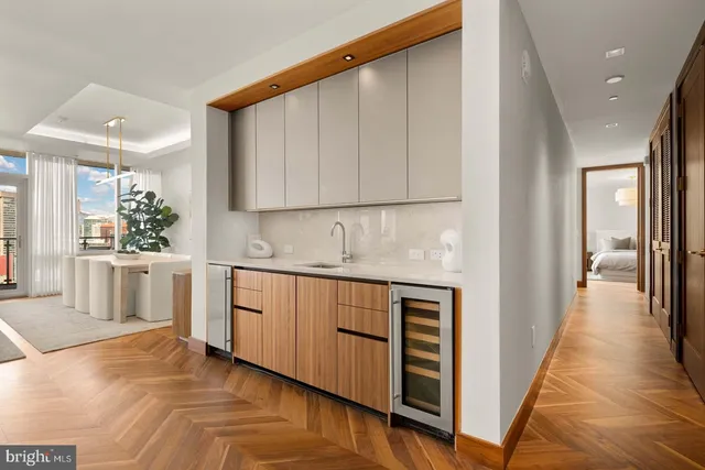 a view of a kitchen with a sink cabinets and a window