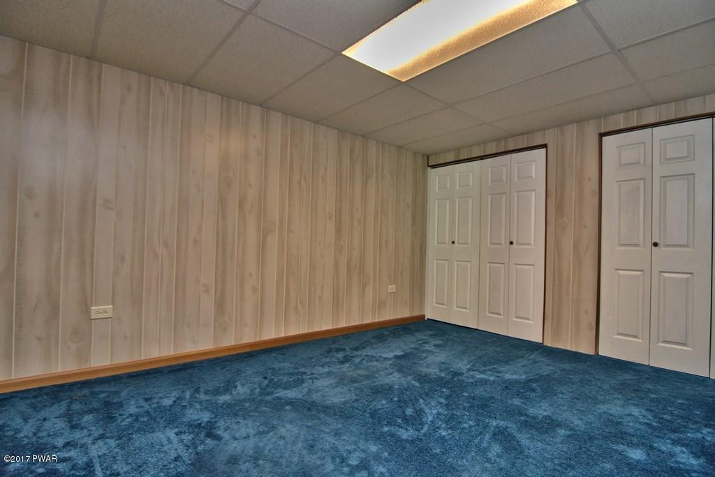 145 Keystone Road Lake Ariel, PA 18436 - Photo 28 of 52 a view of an empty room with wooden door