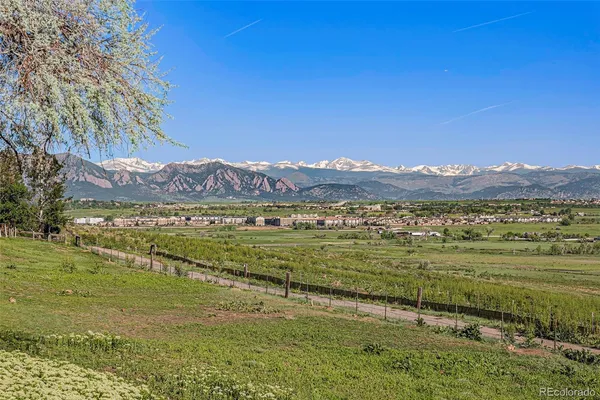 a view of an ocean and a mountain