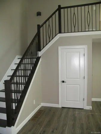 a view of entryway with wooden floor