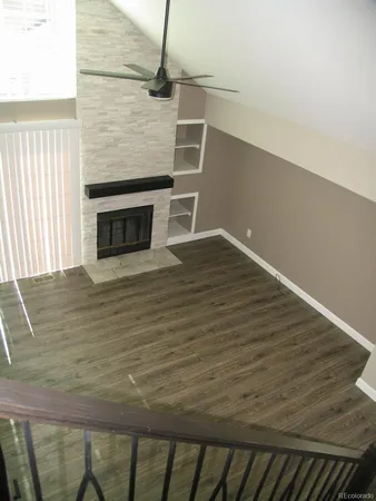 a view of a livingroom with wooden floor