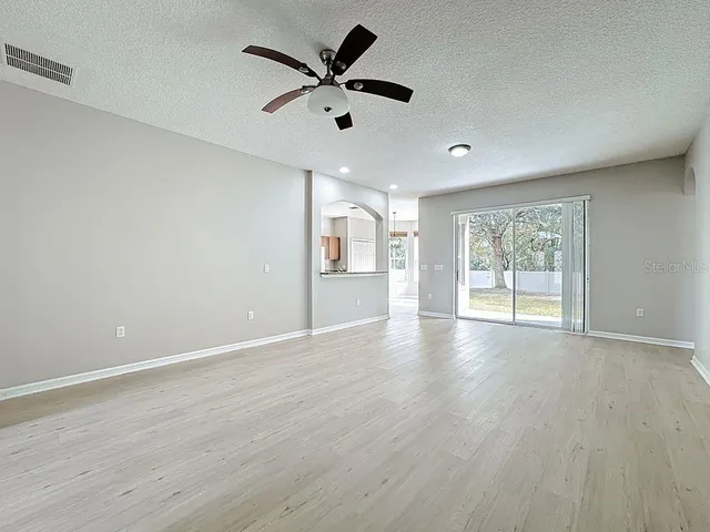 a bathroom with a bath tub with a shower