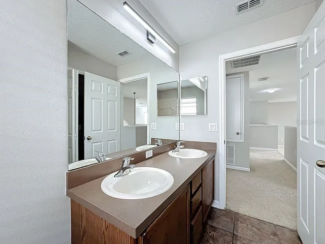 a vase of flowers sitting on a table