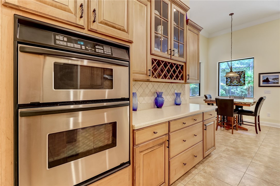 96411 Blackrock Road Yulee, FL 32097 - Photo 11 of 34 a kitchen with appliances and cabinets