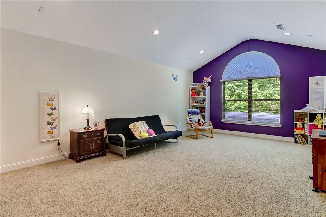 96411 Blackrock Road Yulee, FL 32097 - Photo 28 of 34 a living room with furniture and a window