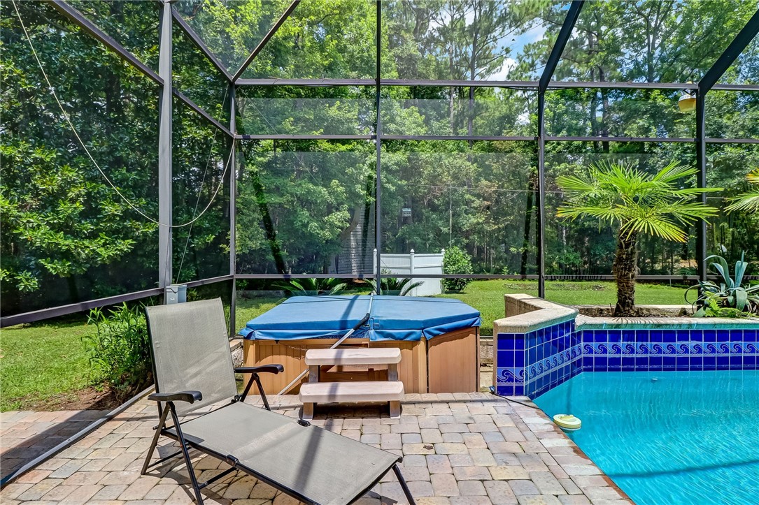 96411 Blackrock Road Yulee, FL 32097 - Photo 33 of 34 a view of a chairs and table in the yard