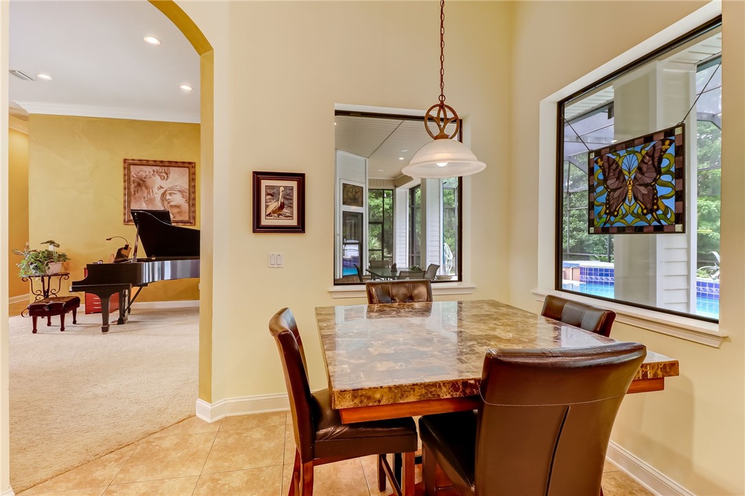 96411 Blackrock Road Yulee, FL 32097 - Photo 8 of 34 a dining room with furniture and window