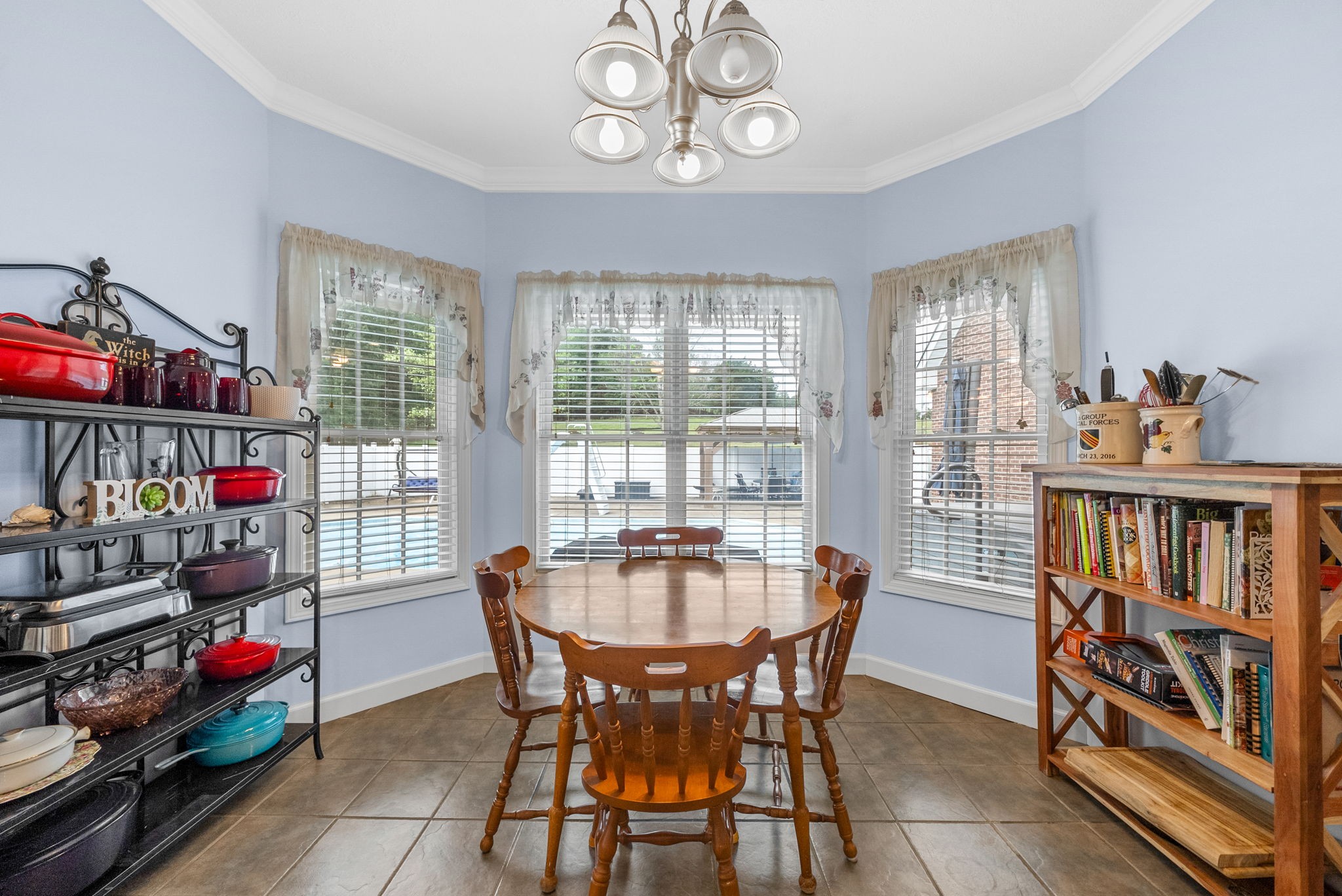 3989 Cadiz Road Bumpus Mills, TN 37028 - Photo 17 of 97 a view of a dining room with furniture window and outside view