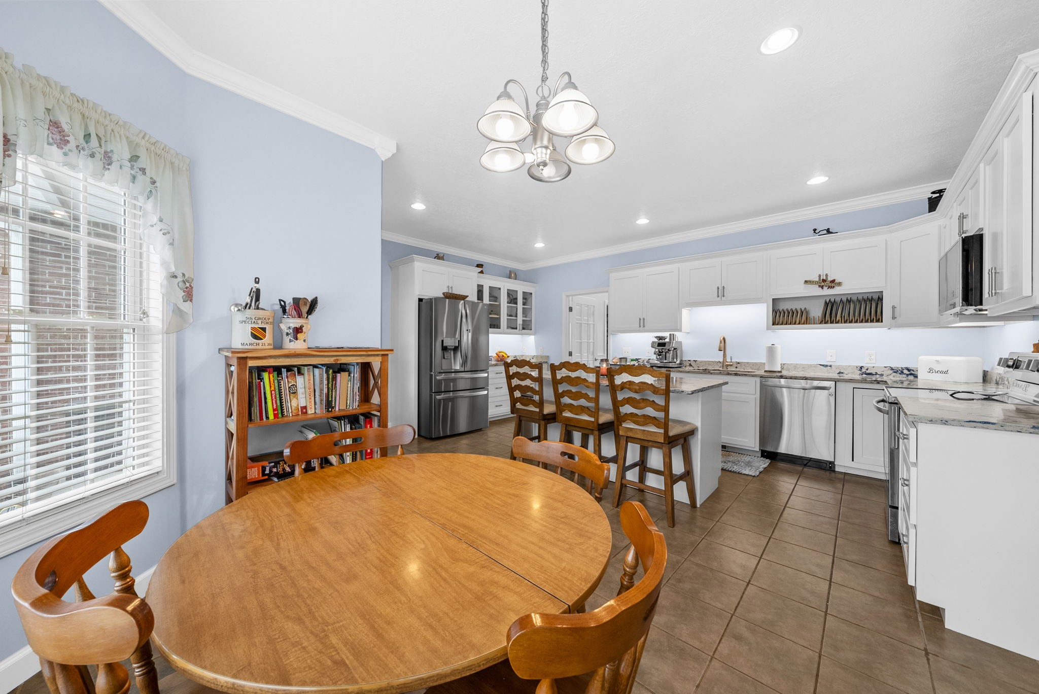 3989 Cadiz Road Bumpus Mills, TN 37028 - Photo 18 of 97 a room with stainless steel appliances furniture and a kitchen view