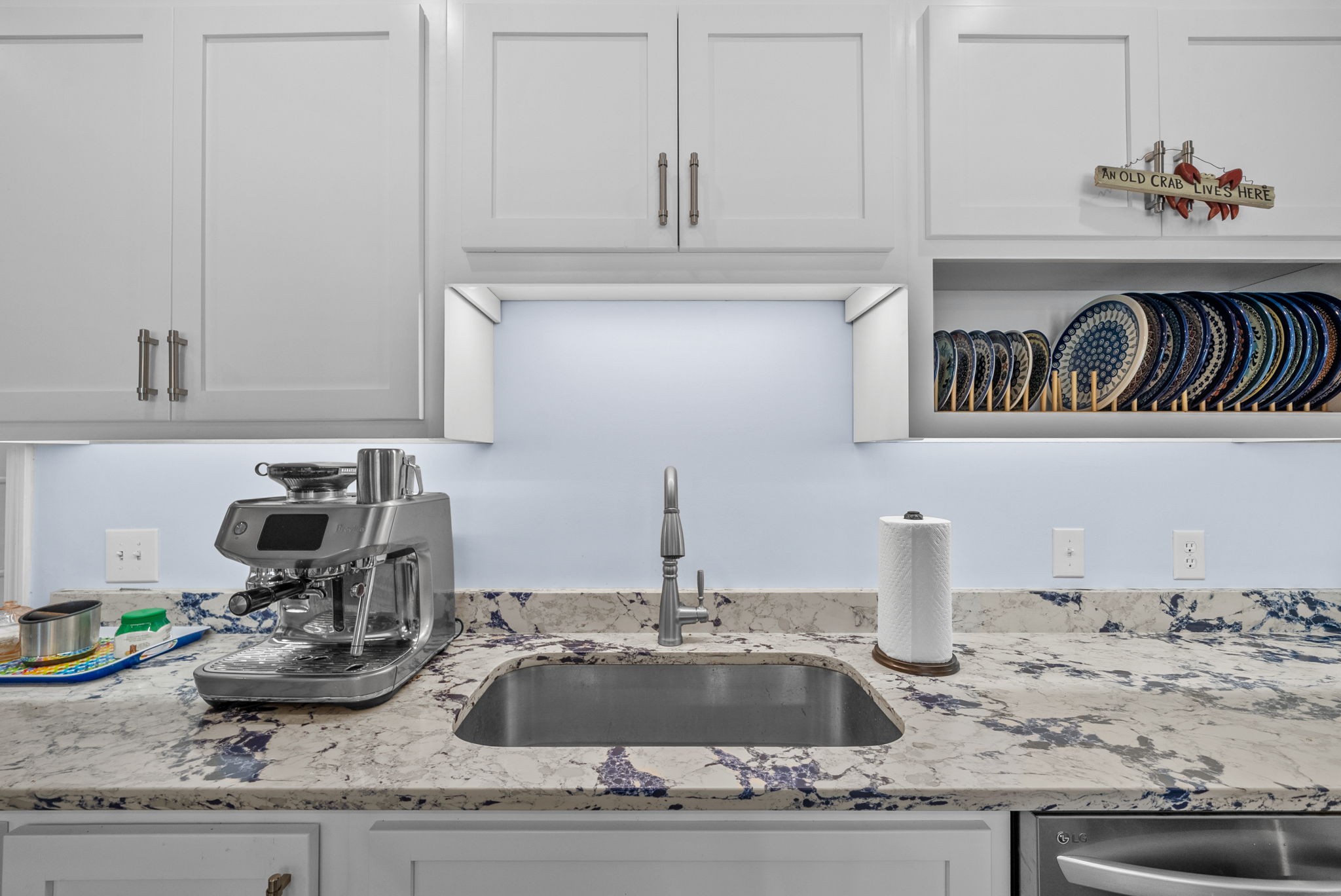 3989 Cadiz Road Bumpus Mills, TN 37028 - Photo 20 of 97 a kitchen with a sink and cabinets