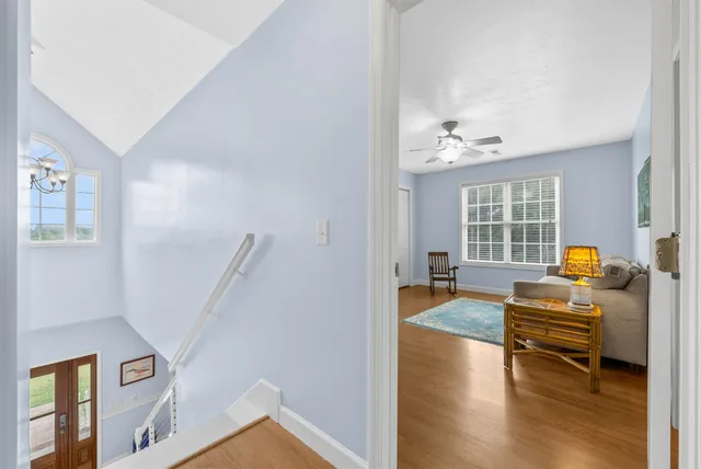 a view of garage with clothes