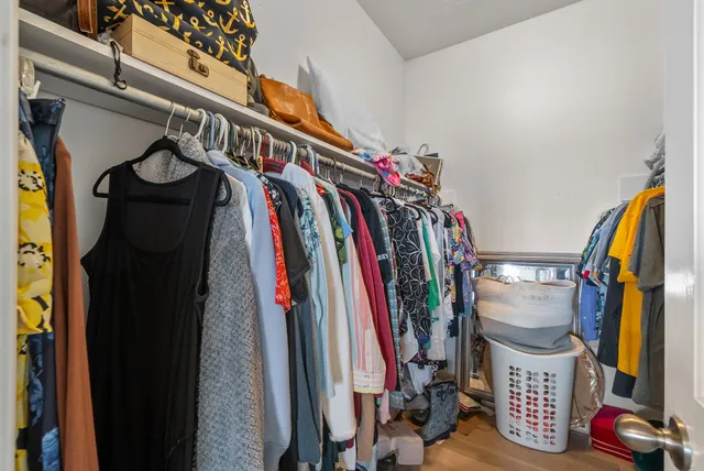 a view of a house with swimming pool and sitting area