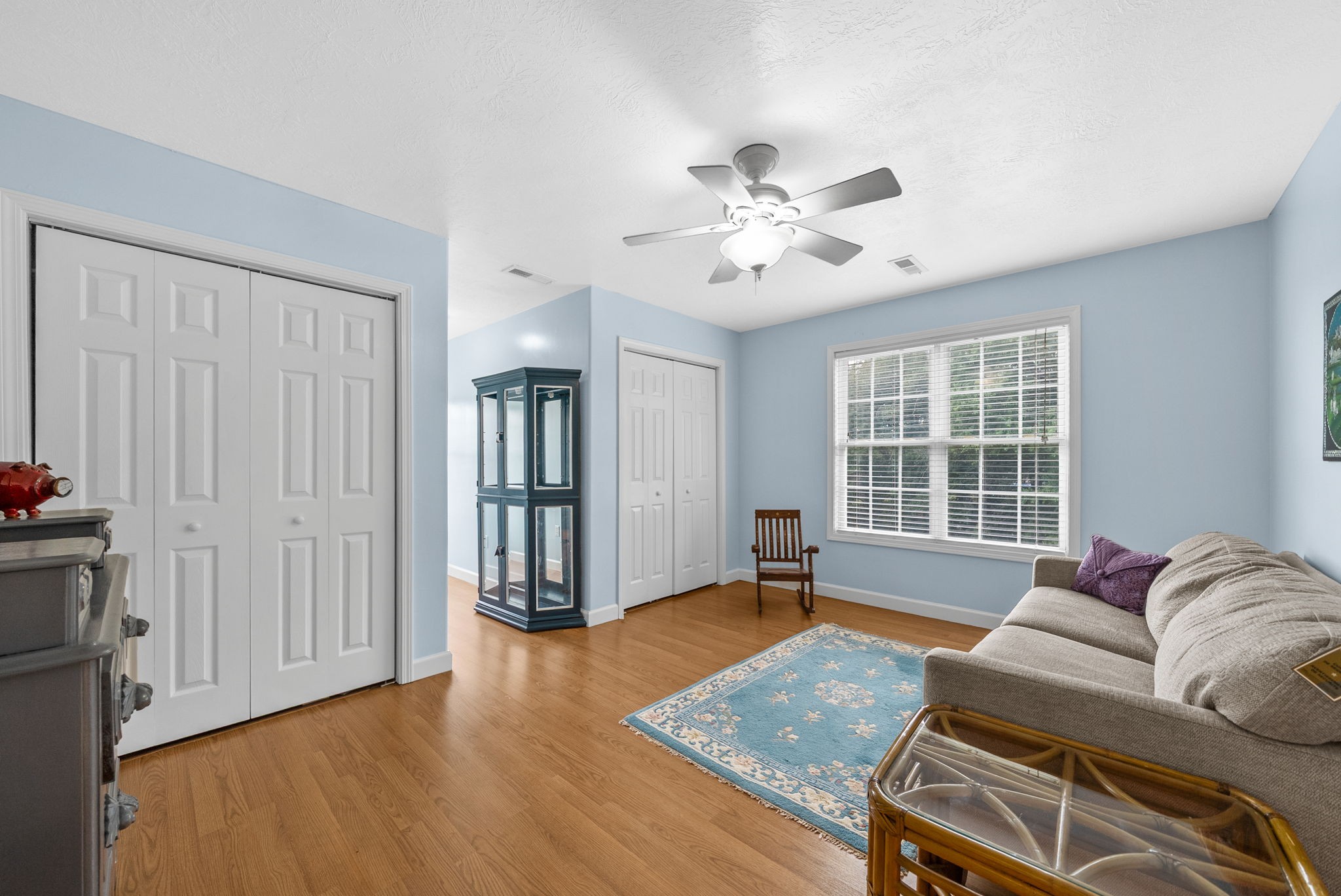 3989 Cadiz Road Bumpus Mills, TN 37028 - Photo 38 of 97 a living room with furniture and wooden floor