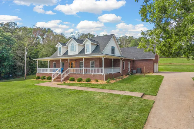 a balcony view with a garden space