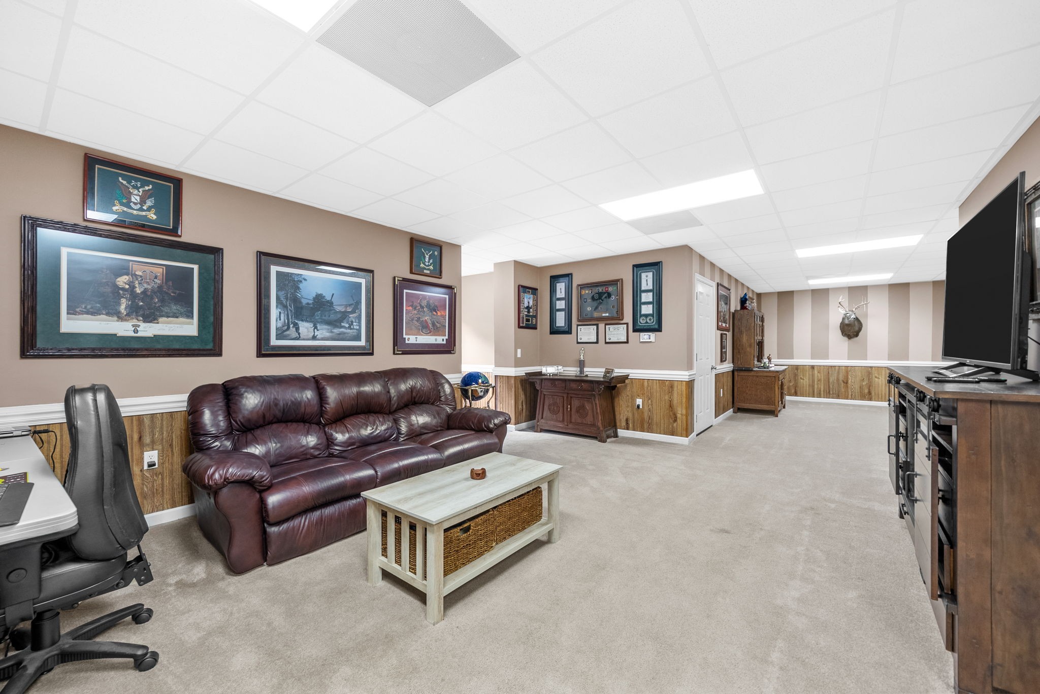 3989 Cadiz Road Bumpus Mills, TN 37028 - Photo 45 of 97 a living room with furniture and a flat screen tv