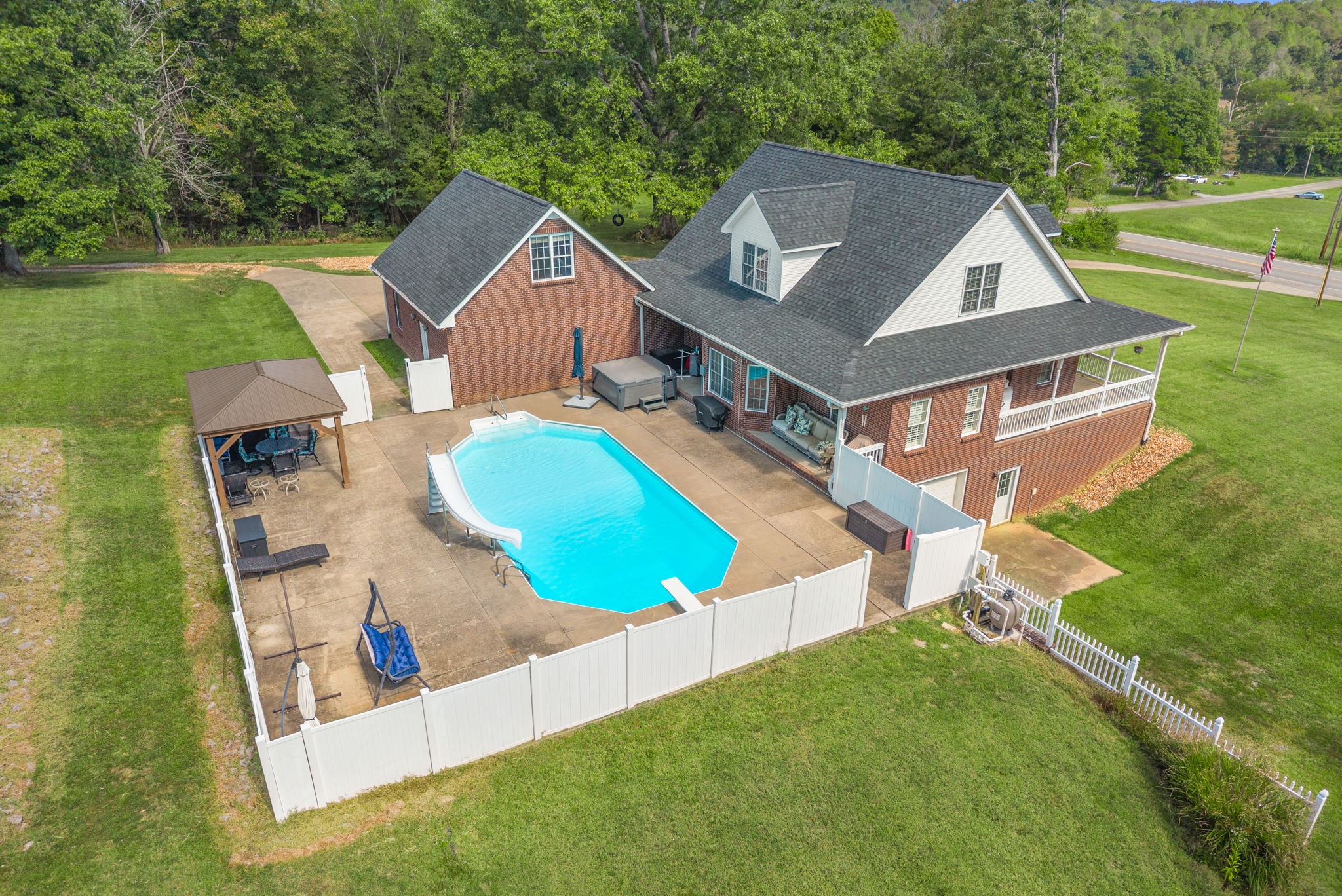 3989 Cadiz Road Bumpus Mills, TN 37028 - Photo 67 of 97 an aerial view of a house