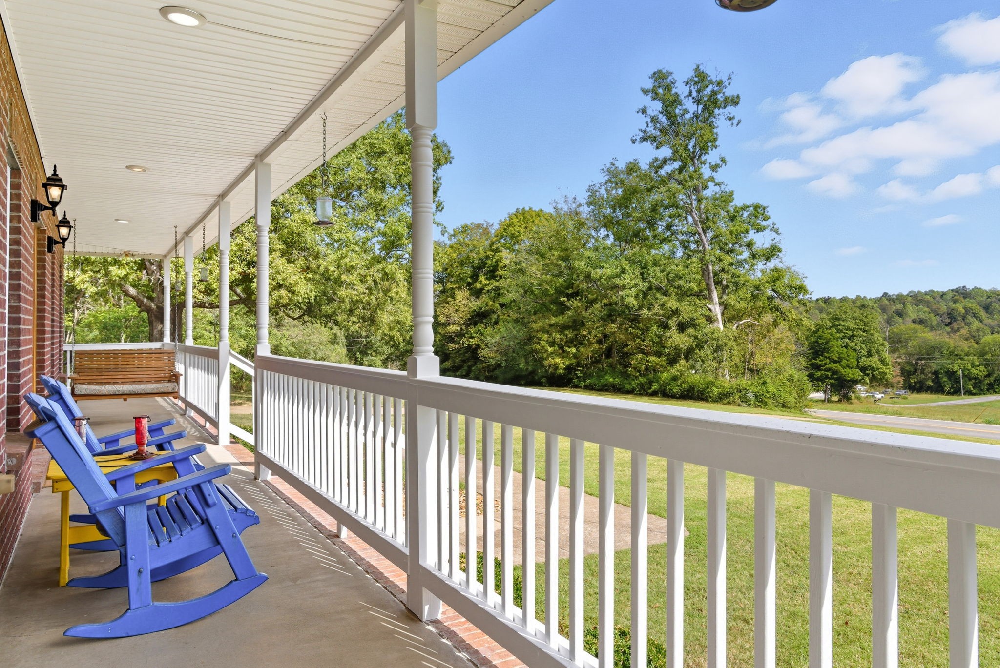 3989 Cadiz Road Bumpus Mills, TN 37028 - Photo 7 of 97 a balcony view with a garden space