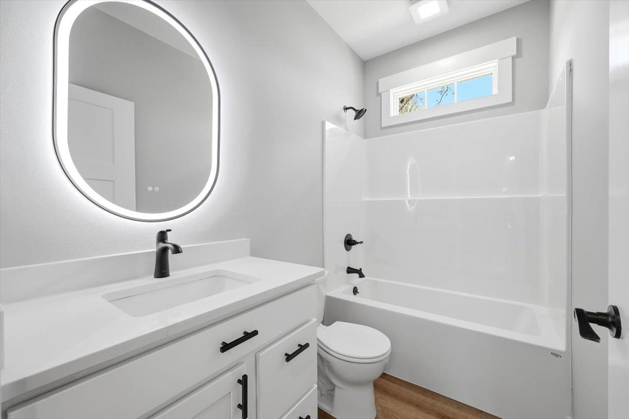 103 Hilltop Terrace Road Staunton, VA 24401 - Photo 24 of 47 a bathroom with a sink a toilet and a mirror