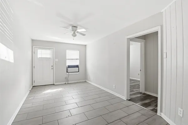 a view of an empty room and window