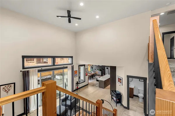 a view of a hallway with furniture and front door
