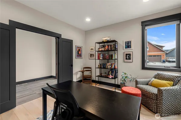 a living room with furniture and a table