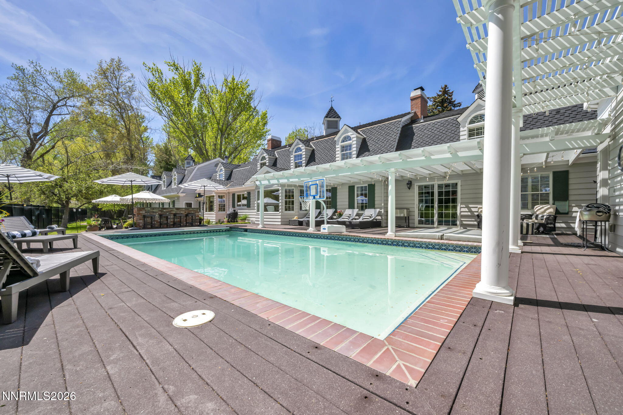 2501 Holcomb Ranch Lane Reno, NV 89511 - Photo 18 of 94 swimming pool view with a seating space and a garden view