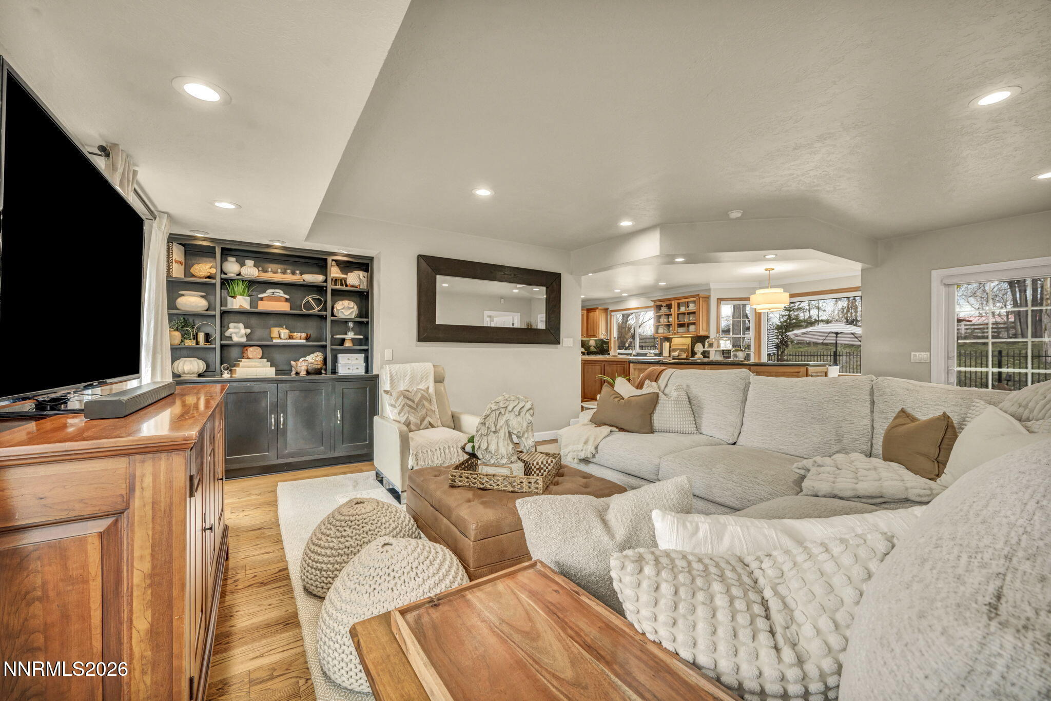 2501 Holcomb Ranch Lane Reno, NV 89511 - Photo 57 of 94 a living room with furniture and a flat screen tv