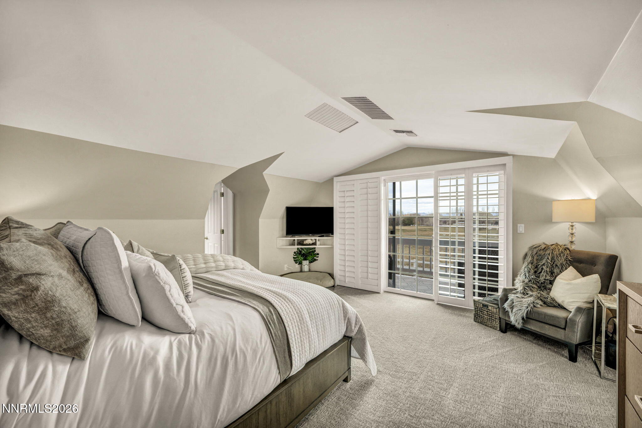 2501 Holcomb Ranch Lane Reno, NV 89511 - Photo 77 of 94 a bed room with a bed and a large window