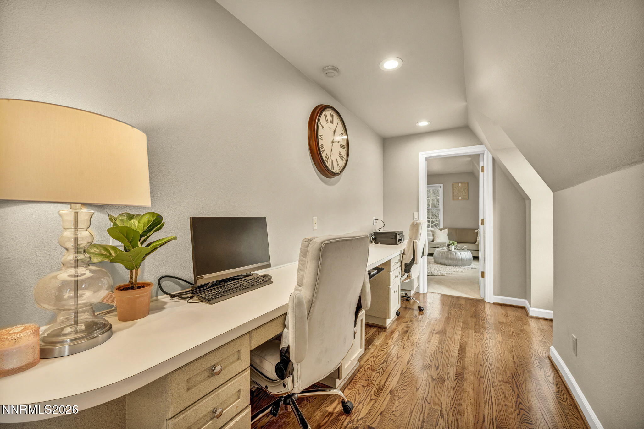 2501 Holcomb Ranch Lane Reno, NV 89511 - Photo 86 of 94 a view of a workspace with furniture and wooden floor