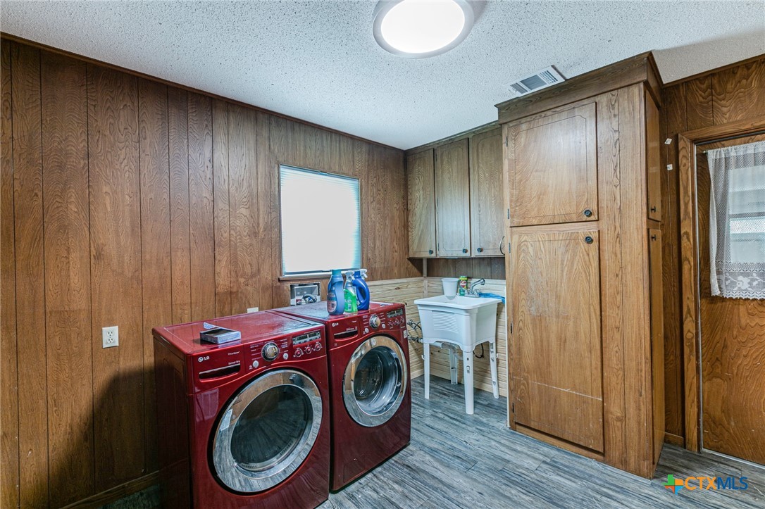 2411 Osage Road Gatesville, TX 76528 - Photo 19 of 29 Laundry/utility room with washer and dryer connections