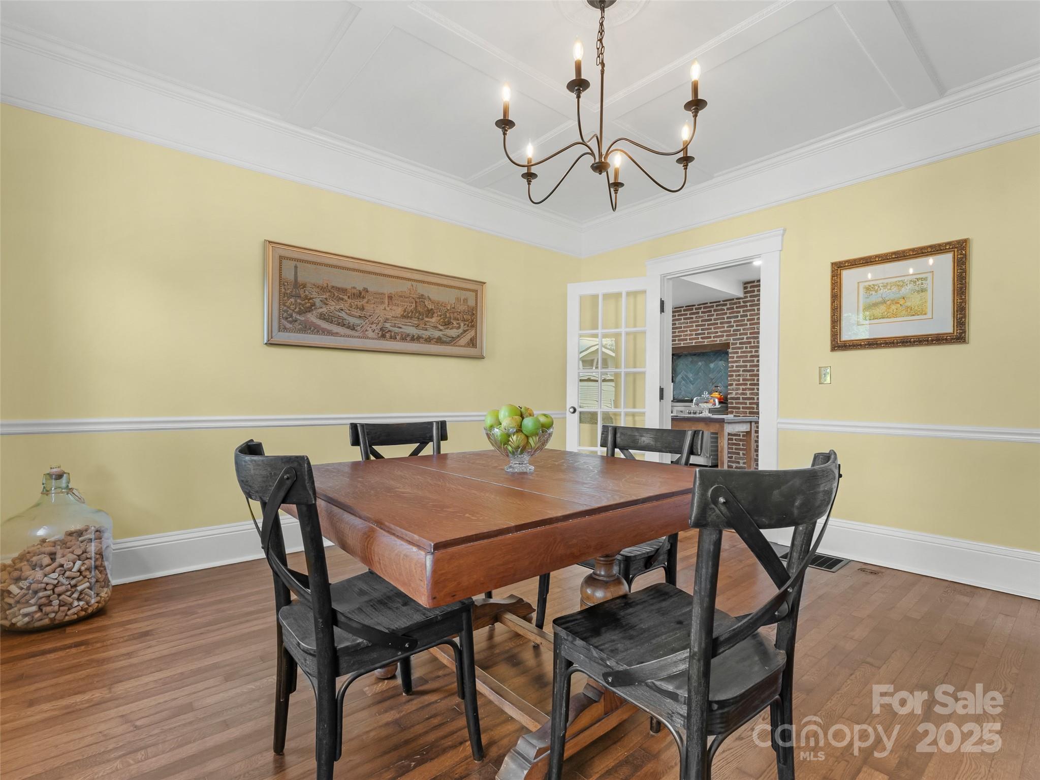 505 North Country Club Road Brevard, NC 28712 - Photo 11 of 48 a view of a dining room with furniture and wooden floor